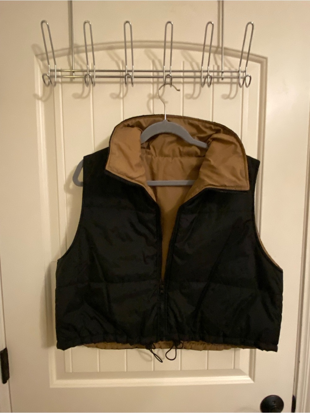 Cropped brown and black puffer vest